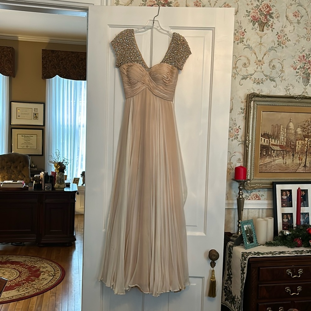 A stunning evening gown by Sherri Hill. Worn once by my daughter while in Dubai.